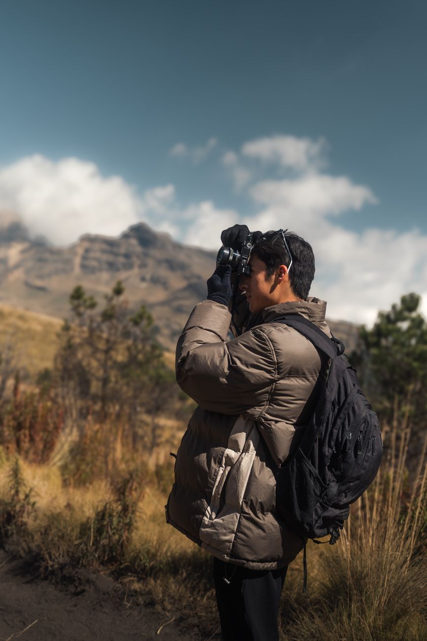 Editorial team member documenting wilderness